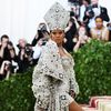 Photos: Trains, Halos, And Rihanna As The Pope At 2018 Met Gala